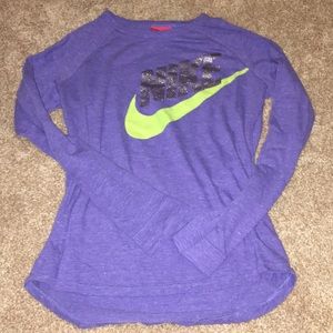 Purple Nike shirt